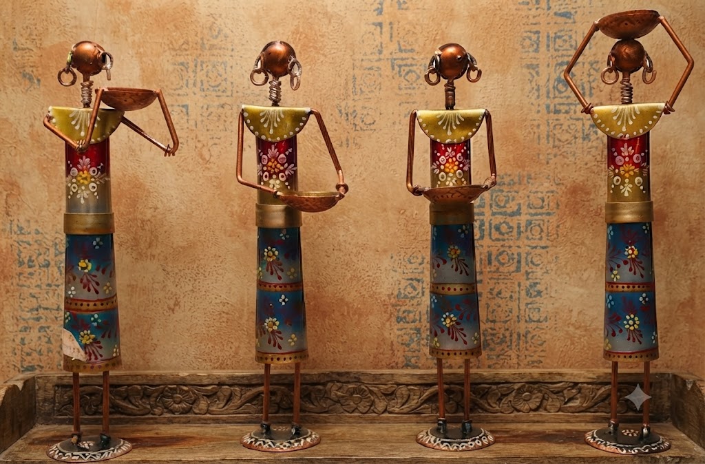 JP-271 ( Handcrafted Rajasthani Village Women Metal Figurine Set – Traditional Folk Art Showpiece (Set of 4) )