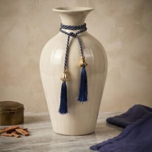 10566 ( Elegant Ivory Ceramic Vase with Blue Tassel Rope Decoration )