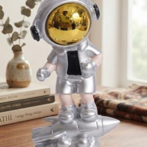 AR3137 ( Silver Astronaut on Rocket Showpiece