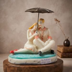 Chattier Couple ( Romantic Couple Under Umbrella Decorative Showpiece  )