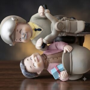 AR 3733 (Cute Elderly Couple on Scooter Figurine)